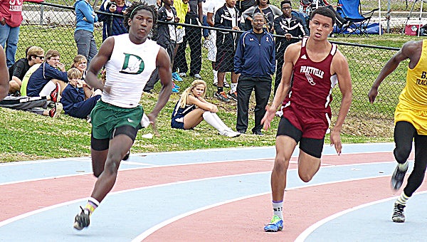 Dallas County’s Brandon Oliver runs in Saturday’s track meet at Montgomery Academy. Oliver and the rest of the Hornets’ boys finished tied for first with Prattville in the team competition,  the first track title the school has won since coach Robert Dolbare helped restart the program four years ago.--Submitted Photo
