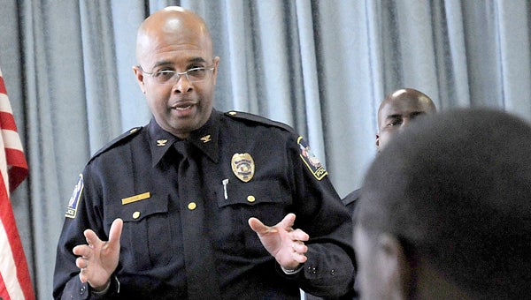 Selma Chief of Police William Riley talks to Clark Elementary School Students during a pizza party Friday provided by the police department’s Police Encouraging Academics, Reading and Learning program.--Josh Bergeron