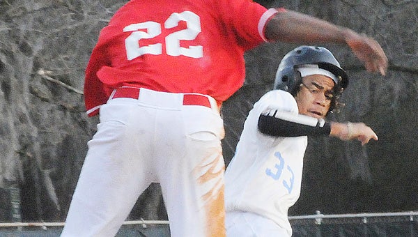 A Selma Saints’ player gets caught in a rundown between third base and home plate in the Saints’ win over Southside Wednesday at Bloch Park.--Daniel Evans