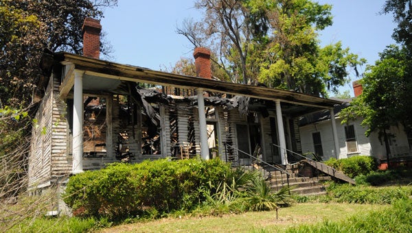 Fire-damaged houses can be seen all over Selma, and some have been awaiting demolition for years. This house near Live Oak Cemetery caught fire more than two years ago. (Christopher Edmunds | Times-Journal)
