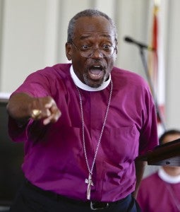 he Episcopal Church’s presiding bishop-elect Michael Curry of North Carolina preaches inside the Lowndes County Courthouse. 