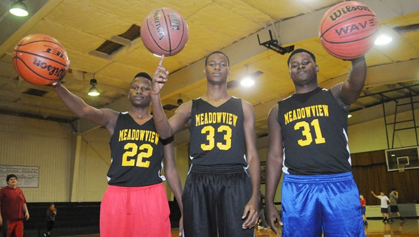 Brothers Kaymon, Justin and Jevar McGuire are helping to carry the scoring load for Meadowview Christian this season.  All three brothers start for the Trojans and have played a role in helping Meadowview get to 3-3 on the season. --Daniel Evans