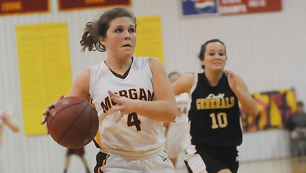 Emily Sherrer races down the floor for a layup during Morgan’s game against Autauga Academy Friday night at home. Sherrer led her team with 14 points, but the Senators fell 51-32. --Justin Fedich