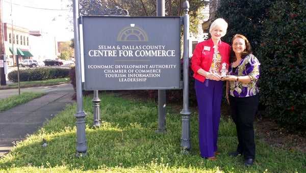 Director of the Selma Dallas County Chamber of Commerce Sheryl Smedley presents Executive Director of Old Cahawba Archaeological Park Lina Derry with the Attraction of the Year Award.  This is the second year the park has won the award. 