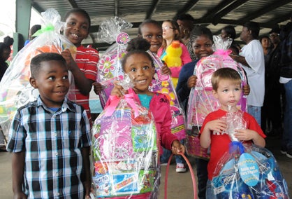  The six Easter egg hunters who found the golden egg at the Selma Easter Extravanganza Saturday stand with their prizes. Back row, from left to right, Kewillan Cook, Celia Watts and Brianna Allison. Front row, from left to right, Calvin Craig Jr., Ebony Smith and Raylan Sheehan.