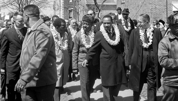 John Lewis, Ralph Abernathy, Martin Luther King and Ralph Bunche are shown in this recently discovered photo from The Huntsville Times archives. The photo was taken on March 21, 1965, the day the Selma to Montgomery march started. 
