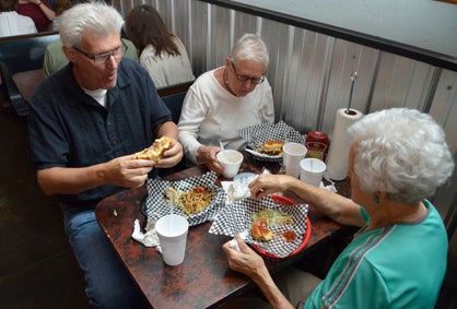 Mike Lewis, Snookie Parrish and Ruth Lewis eat lunch at the restaurant Friday. 