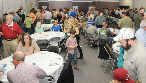A large crowd filled the George P.  Evans Reception Hall Friday night for the National Wild Turkey Federation banquet. --Justin Fedich
