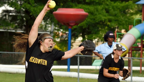 Meadowview Christian’s Shelby Boswell throws a pitch during Monday’s game against Victory Christian.  The Trojans won both games and qualified for the Alabama Christian Athletic Association playoffs. --Daniel Evans