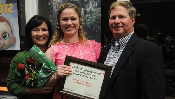 2016 Girl of the Year Mary Lauren Stewart poses for a photo with her parents, Shannon and Jon. The annual Girl of the Year program was held Tuesday evening at the Larry D. Striplin Performing Arts Center. 