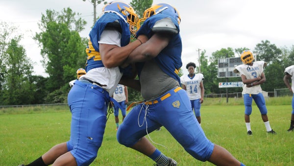 The Keith Bears held their first day of spring football practice Monday for about an hour before lightning forced the practice to end early.  Keith head coach Harry Crum has some talent returning, headlined by junior running back Domonique Jones, but the Bears have to fill some holes left by departing seniors. — Justin Fedich