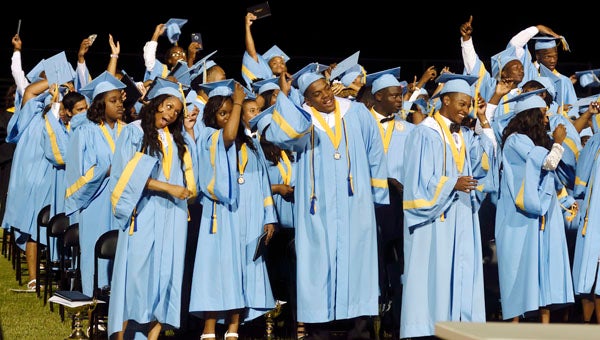 The Selma High School graduating class flips its tassels.  --Daniel Evans