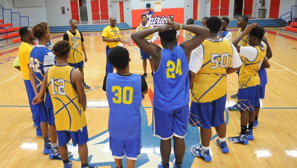 The Keith basketball team huddles together during a practice at Wallace Community College Selma earlier this year.  The Bears are one of the host teams for the upcoming Selma Summer Slam basketball playdate, which will take place June 1 at Selma High School, Concordia College Alabama and Wallace. --File Photo