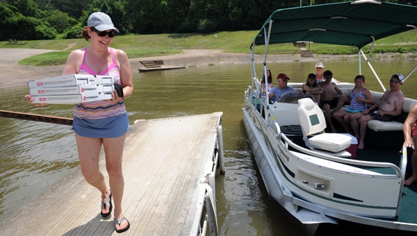The Vines family had pizza delivered to their boat before heading back to enjoy a day on the river on Thursday, June 16.