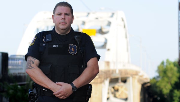 Selma Police Department officer Michael Kiser stopped a woman in her 40s from jumping off the Edmund Pettus Bridge on Thursday afternoon. The woman was taken to the Vaughan Regional Medical Center for treatment and observation.