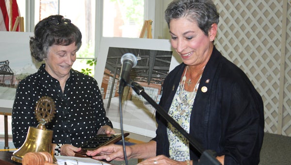 ArtsRevive executive director Martha Lockett (left) was named the Selma Rotary Club’s Citizen of the Year on Monday. Lockett thought she had been invited to speak about ArtsRevive but was instead surprised with the award by club president Manera Searcy. 