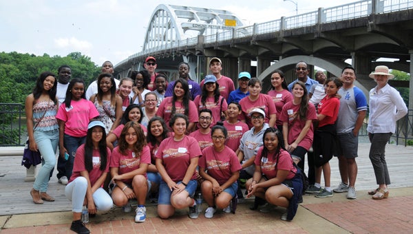 Students from Sun Valley Magnet School’s high school leadership class pose for a photo with Mayor George Evans and Sheryl Smedley, Chamber of Commerce executive director, at the Song of Selma Park on Saturday.  The students traveled from Los Angeles. — Emily Enfinger