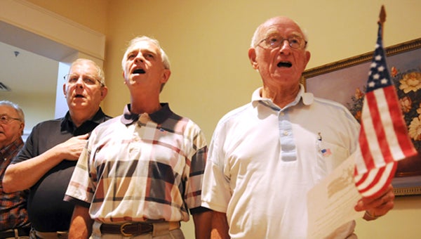 John Coon, Austin Wayne Calloway and Frank Calloway sing during the Fourth of July celebration at Cedar Hill at Vaughan Place on Tuesday. -- Emily Enfinger
