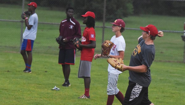 The Selma 14-year-old All-Star team warms up Tuesday night at the Complex.  The team will play in the World Series Saturday in Pineville, Louisiana. -Daniel Evans