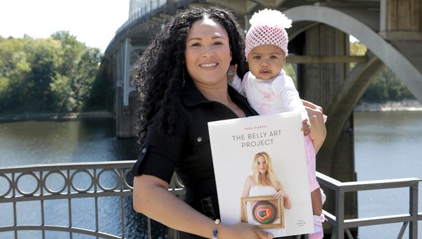 Alicia Roye Chestnut was part of a book called “The Belly Art Project” with her then yet-to-be-born daughter Cadence. 