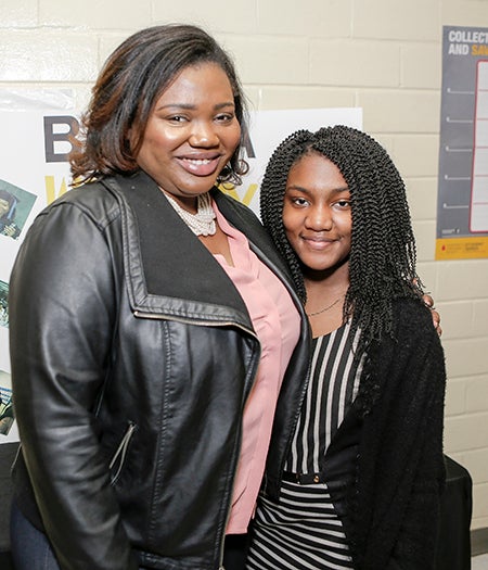 District Court Judge for Wilcox County Briana Westry Robinson poses for a photo with R.B. Hudson eighth grader Amari Williams Friday. Williams portrayed Robinson for a class project. 