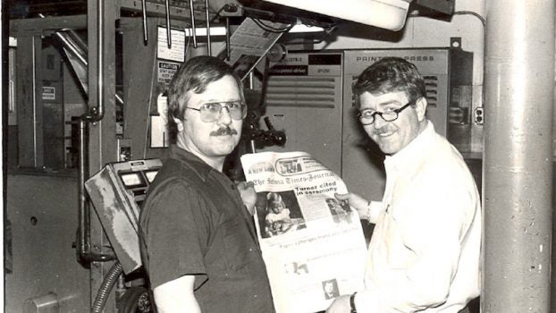 Current Clanton Advertiser production manager Jimmy Ruff (left) is shown with former Selma Times-Journal publisher Shelton Prince during a STJ press run in the late 1970s. 